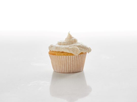 Lumpy, artificial tasting frosting on cupcake made with plant-based spread